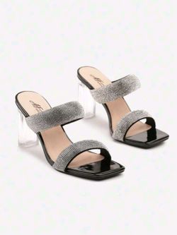 Sandalo con tacco trasparente, doppio cinturino e strass neri